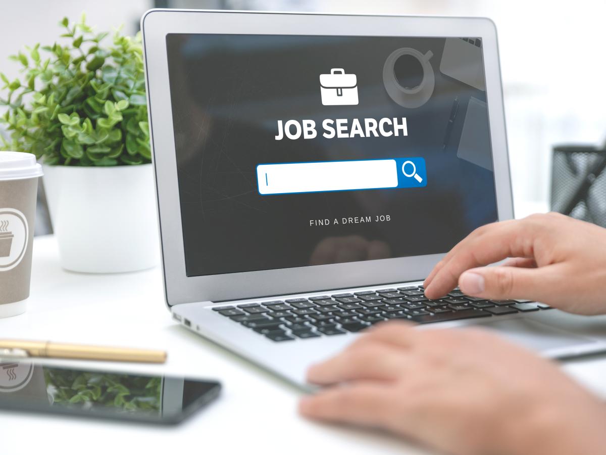 Person at a laptop doing a job search.